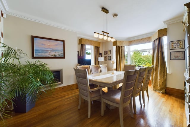 The bay fronted dining room has space for a larger style dining suite.