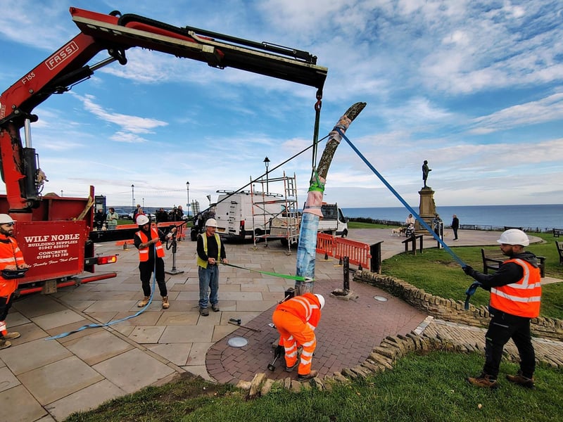 The second of the two bones being removed and loaded on to a truck.