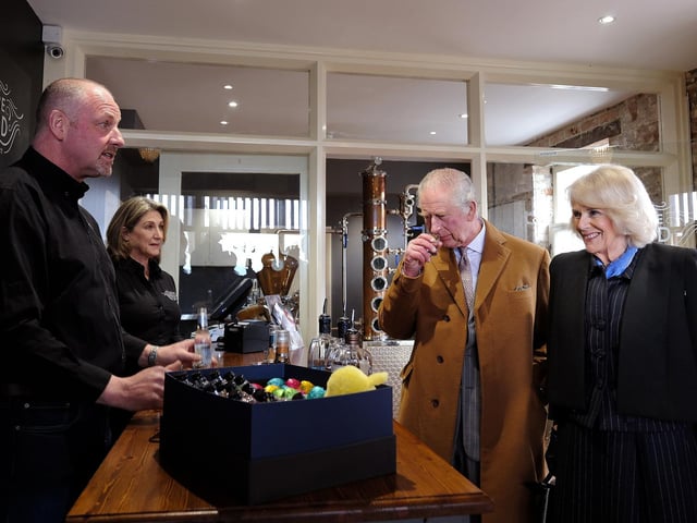 King Charles tries some of the gin by Rare Bird Gin Distillery.