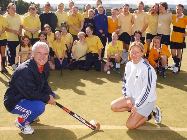 England hockey team coach Norman Hughes training session with Pindar School's young players, with the school's head of sport Sue Barker.
