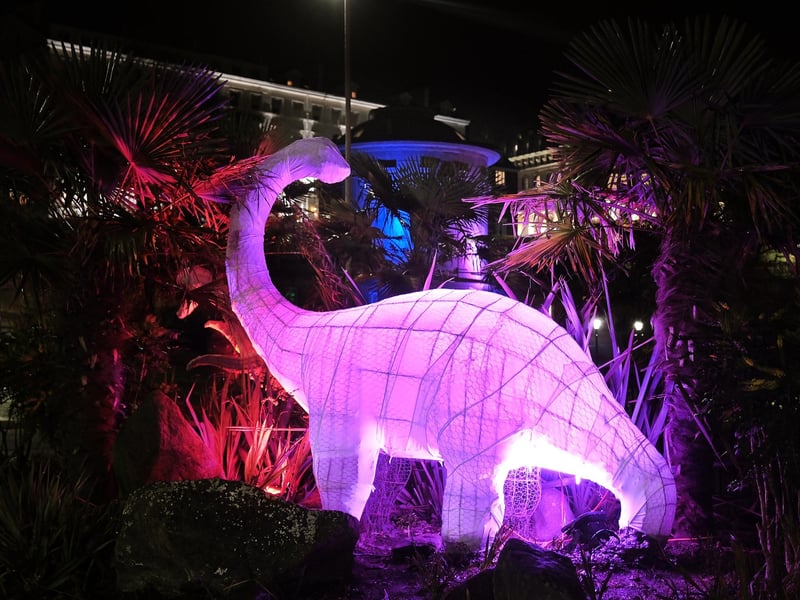 The colourful dinosaurs light up the night.