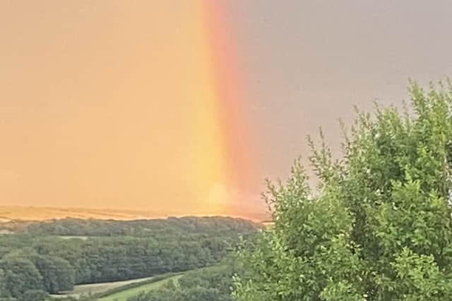 After the thunderstorm everyone was asking for to quell the moor fire, it was granted on Wednesday evening followed by a rainbow looking over to the moor from Ruswarp. photo: Irene Gowland