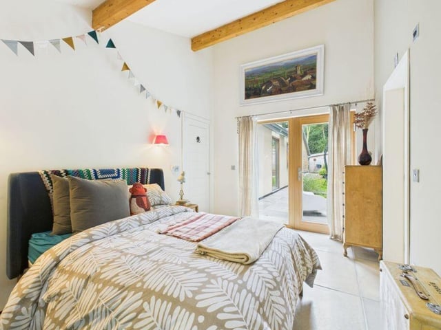 A double bedroom with outdoor access.