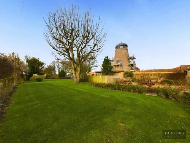 The large lawned garden, adjacent to the historic Bempton Mill.