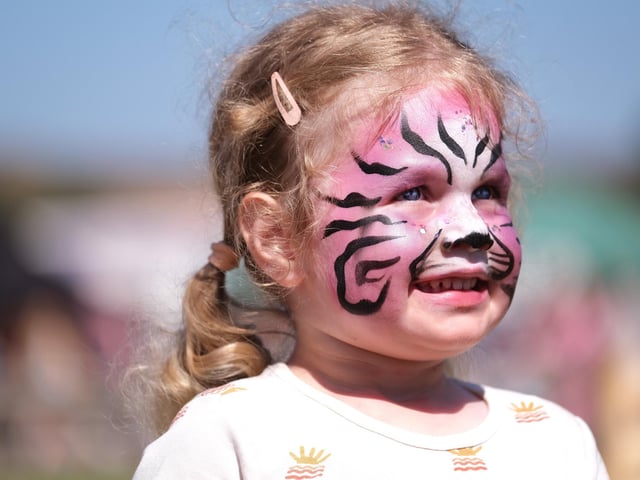 Isla Straw in her tiger face paint