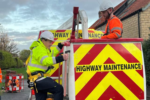 MP Kevin Hollinrake climbs onboard a cherry picker