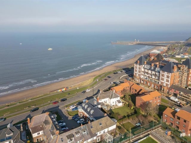 An aerial view of the house and its stunning location.