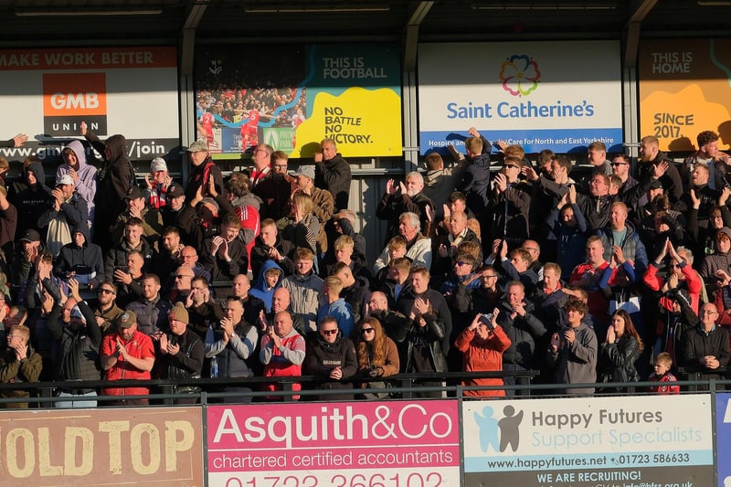The Boro supporters cheer on their team.
