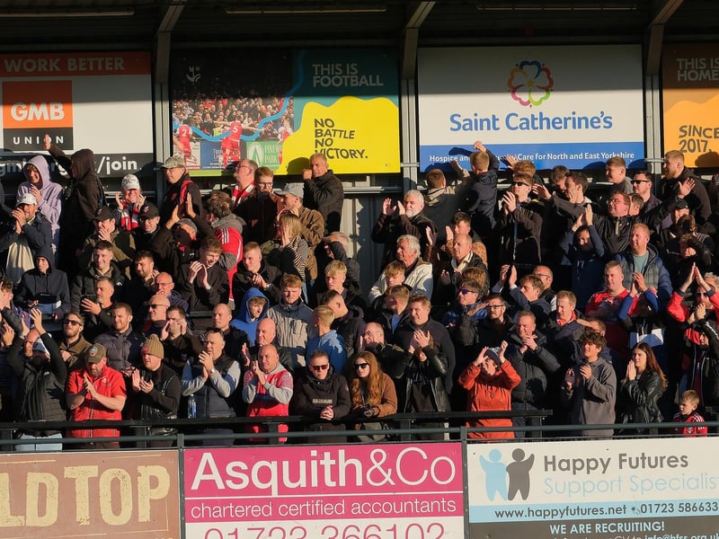 The Boro supporters cheer on their team.