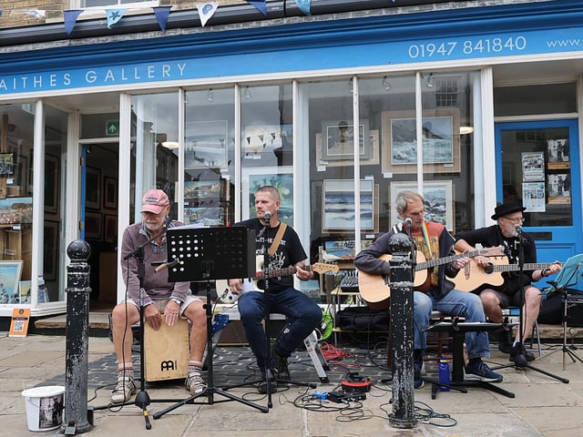 Live music outside Staithes Gallery. photo: Richard Ponter