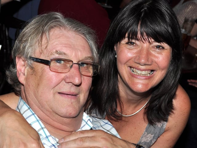 Roger and Joanne share a moment
