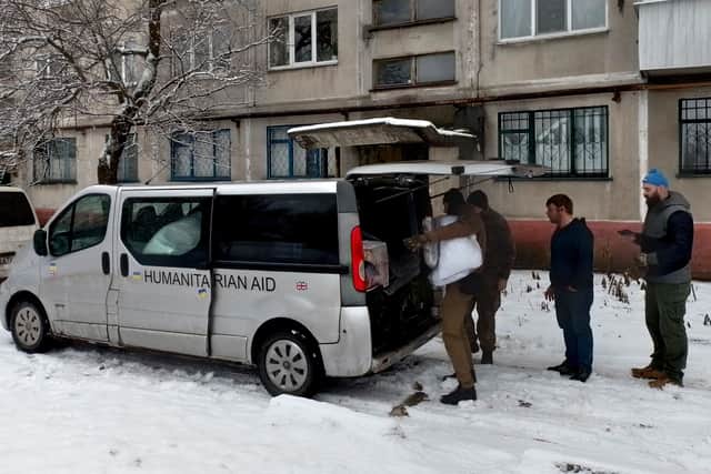 Humanitarian aid in the minibus offered to people of Ukraine.