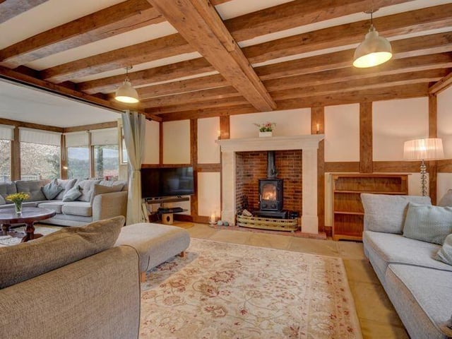Large windows allow natural light to flood in to the main living areas.
