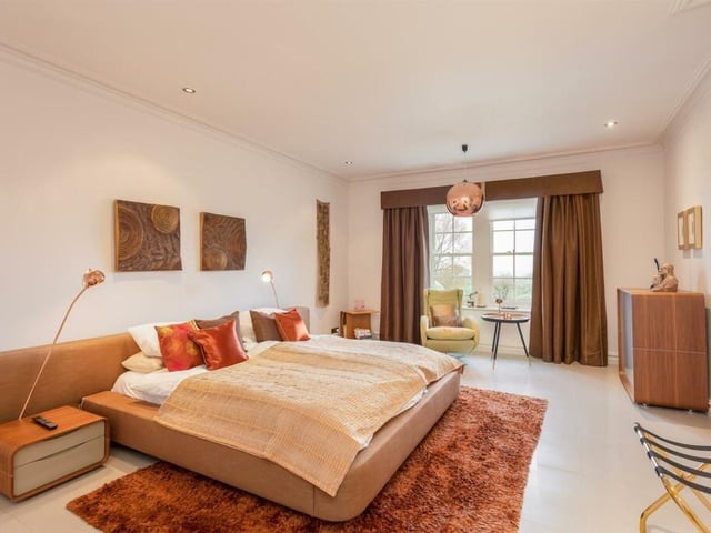 The principal bedroom suite has a dressing room and luxury en suite bathroom, with steam room.