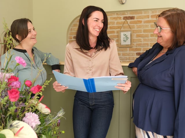 Rachel, Chloe and Lynsey chat in reception. photo: Richard Ponter