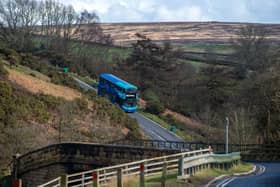 A Coastliner bus approaches Goathland which is on the route of Britain's most scenic bus route, has been saved from the axe with a sudden rush of tourists taking advantage of the £2 fares. Picture by Yorkshire Post Photographer Bruce Rollinson.