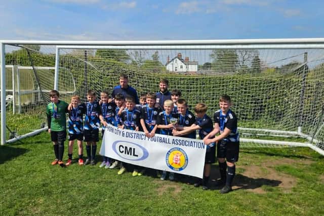 Yorkshire Coast Blues U11s celebrate their cup final win to cap an invincible season.
