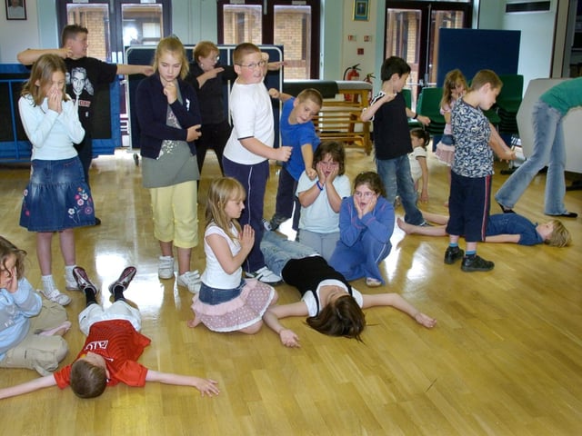 Children take part in a drama workshop at St Peter's School during the last week of the summer holidays.