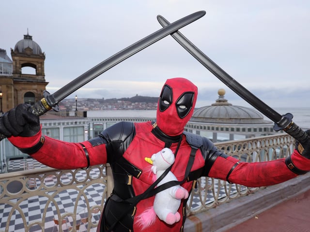 Deadpool leaves the building.