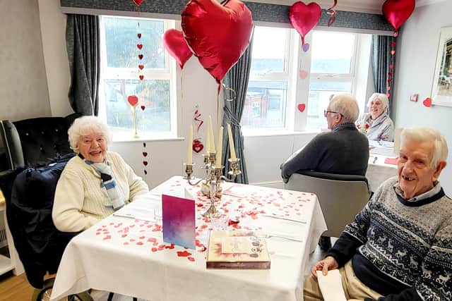 Brenda and Andy celebrate together.