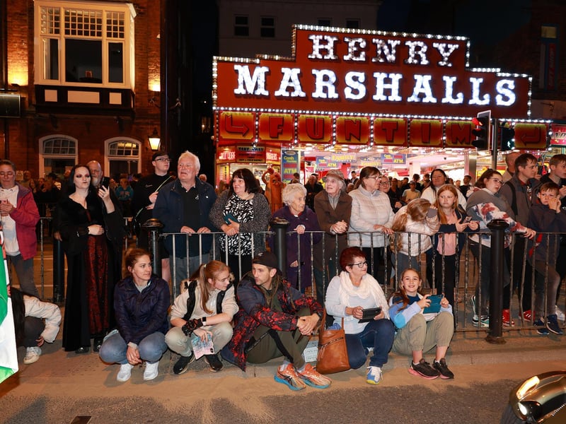 Crowds gather to watch the parade