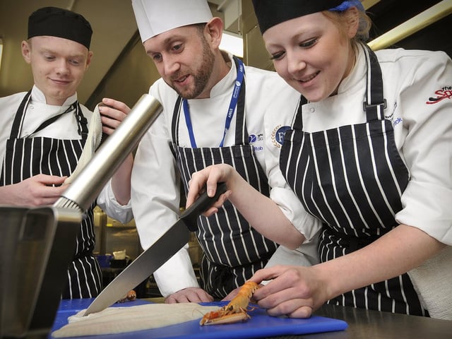 YCC Seafood Young Chef of the year competition. Student Courtney Ives, Tutor Rob Clark, Student Lorna Raistrick.
Picture: Richard Ponter.