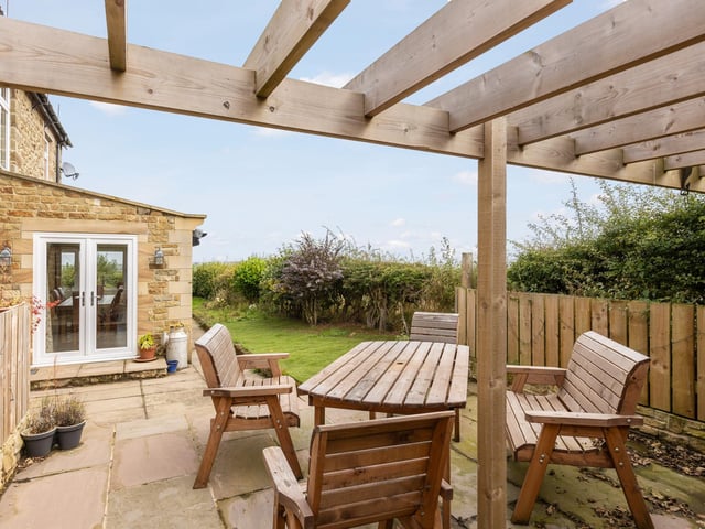 A covered outdoor seating area.