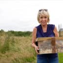 Hilary Koll with a harvest mouse
