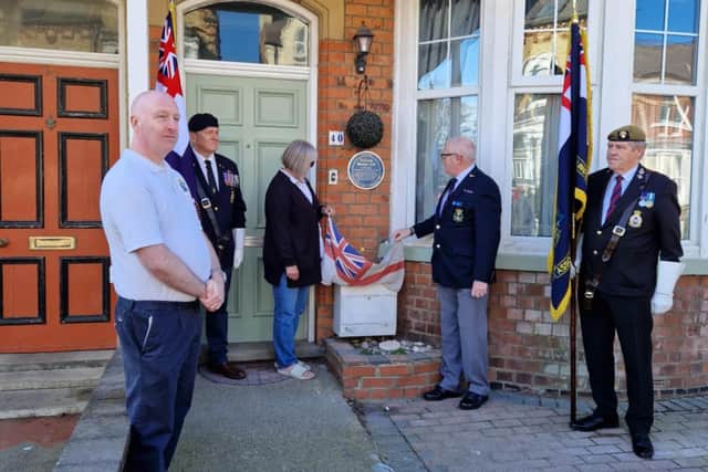 The unveiling of the plaque for Able Seaman William Becker, at Trinity Road in Bridlington.
