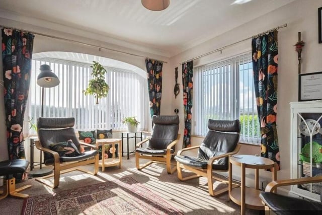 A lovely double aspect room within the house.