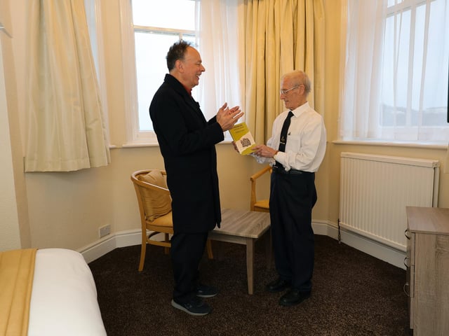 Dr Paul Elsam chats to local historian Len Friskney in Wilfred Owen's room