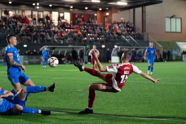 Sub Luke Rees scores the fifth goal against Dunston in the replay on Tuesday. PHOTOS BY WANDERING PHOTOGRAPHY