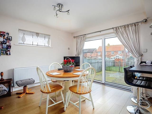 A bright and versatile dining or family area.