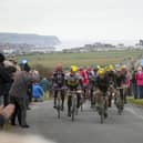 Cyclists make their way through the outskirts of Whitby during the Tour de Yorkshire
