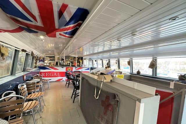 Inside the historic boat with three decks, that is fully licensed and has seating for 120 people.