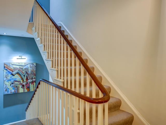 The staircase between floors in the building.
