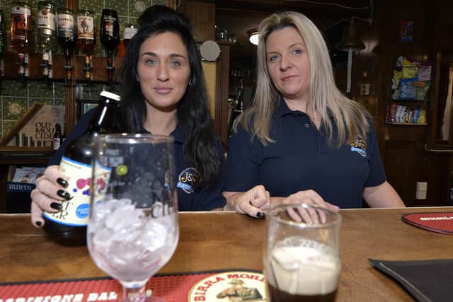Nags Head staff member Sara Ricotta and Owner Stacey Durham.