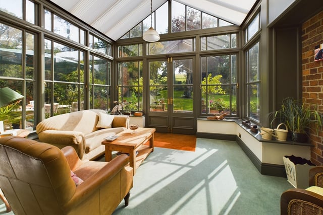 The sizeable conservatory makes another appealing room.