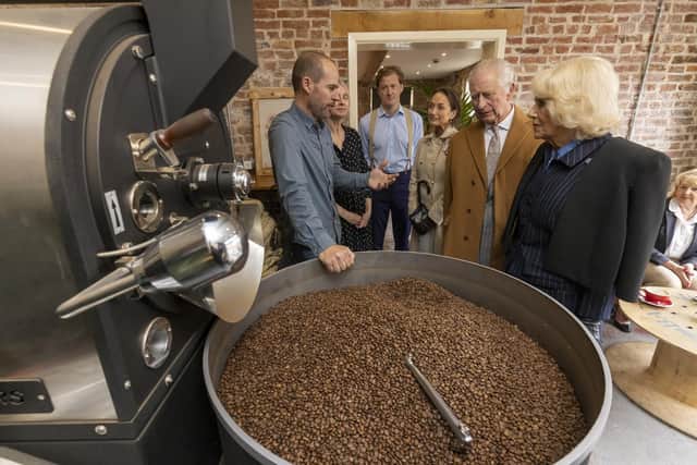 King Charles III and the Queen Consort during a visit to Talbot Yard Food Court in Yorkersgate, Malton, North Yorkshire to meet food and drink producers with shops and to hear more about their locally produced goods. James Glossop/PA Wire
