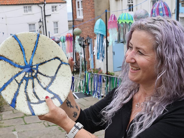 Emma Evett with her pottery. photo: Richard Ponter