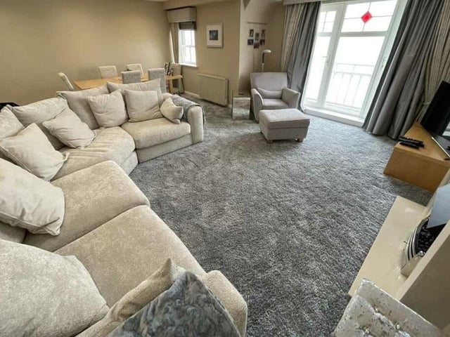A spacious lounge with balcony - and fabulous sea views.