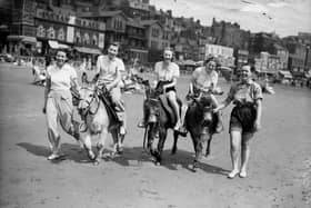 July 1936:  Day trippers on Scarborough Beach.
