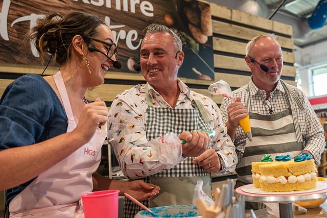 Dave and Rob Nicholson baking with Charlie Lowe of HG1 Bakes at the Food Theatre on the second day of the show