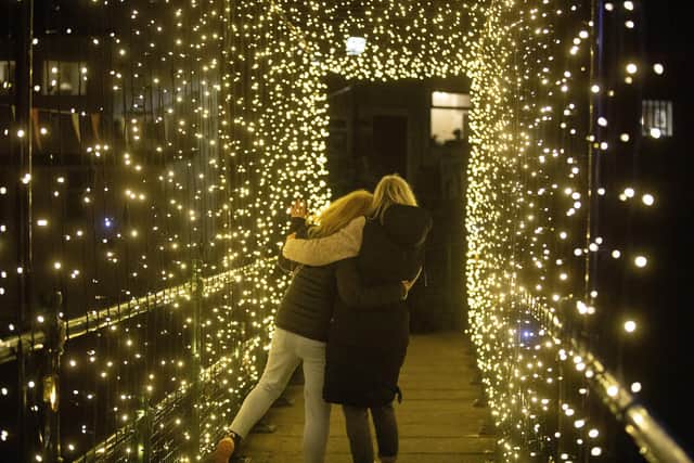 Crossing the bridge of lights at Staithes Festival. picture: Duncan Lomax
