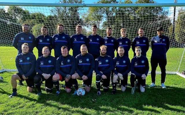 Ayton line up before their 5-0 home win against Snainton in their new training tops sponsored by Wheatcroft Preschool in St Michaels Youth Hall