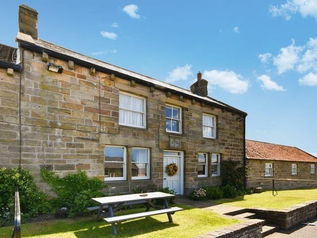 The charming front aspect of the four-bedroom Wheatsheaf Cottage in the pretty village of Egton.