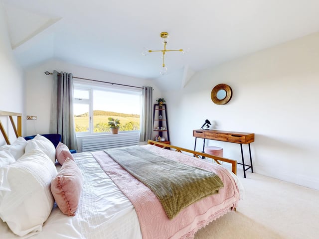 All three double bedrooms within the house look out over miles of countryside.