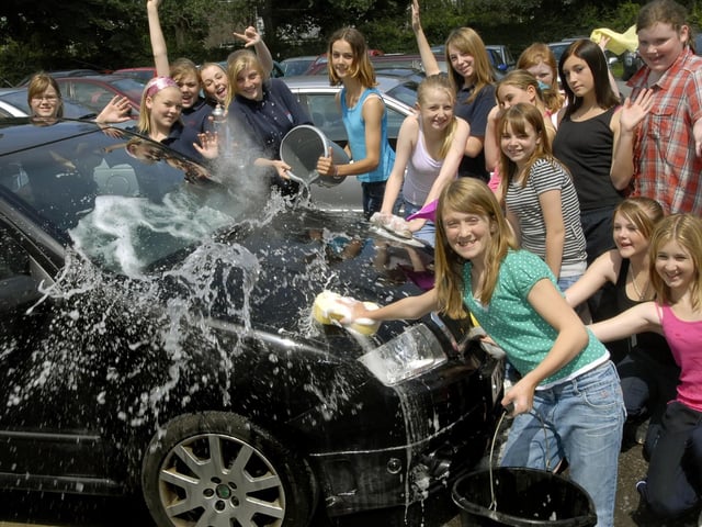 Girls get the cars sparkling in a charity car wash at Pindar School, Scarborough.