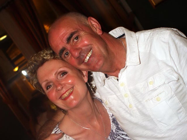 Jackie and Peter painting the town red.