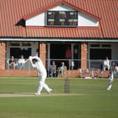 Nathan Saltmer hits his first boundary on his way to Pocklington CC's top score. Photo by Phil Gilbank